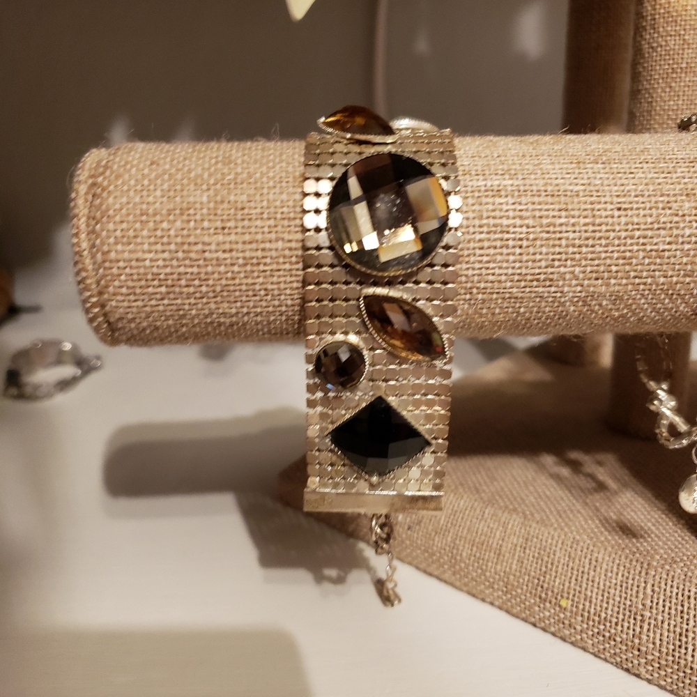 Clasp bracelet with multi colored jewels